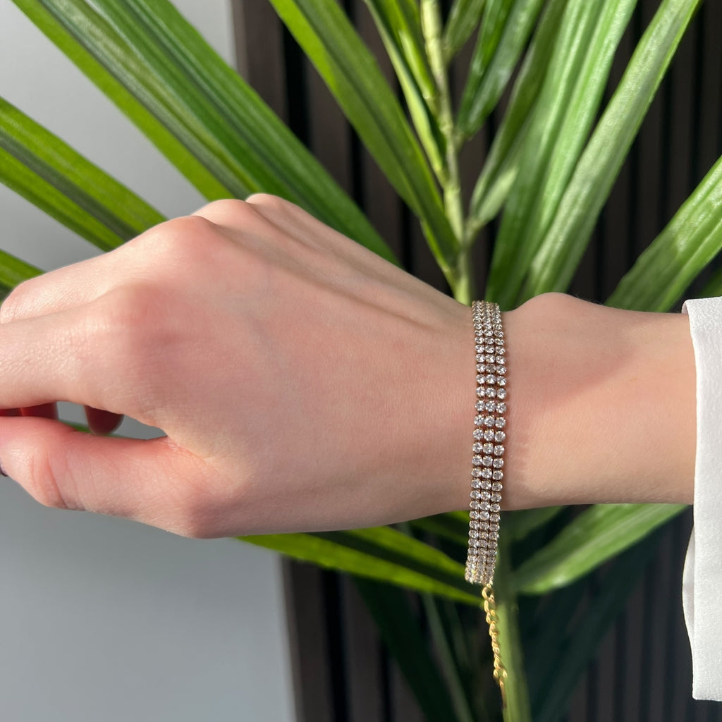 Bredt tennisarmbånd med klare cubic zirkonia