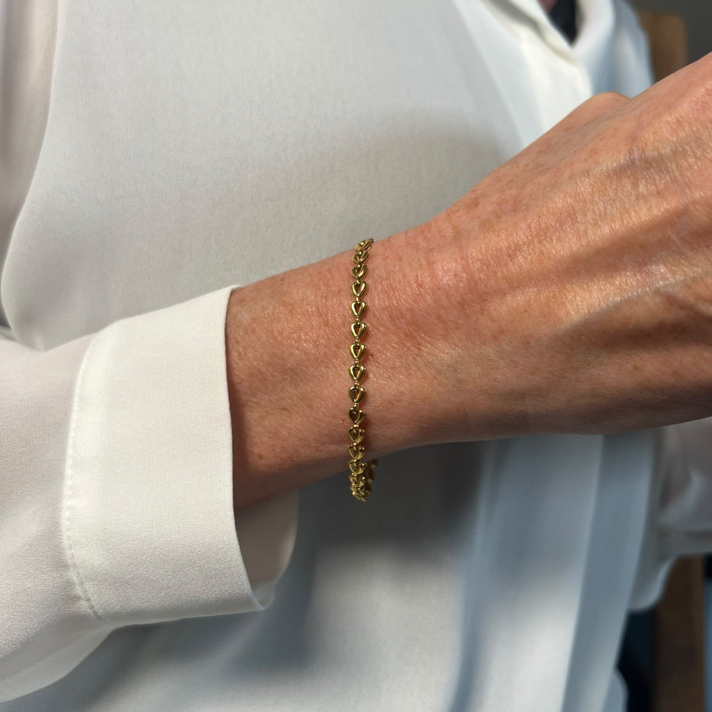Fladt armbånd med hjerteled