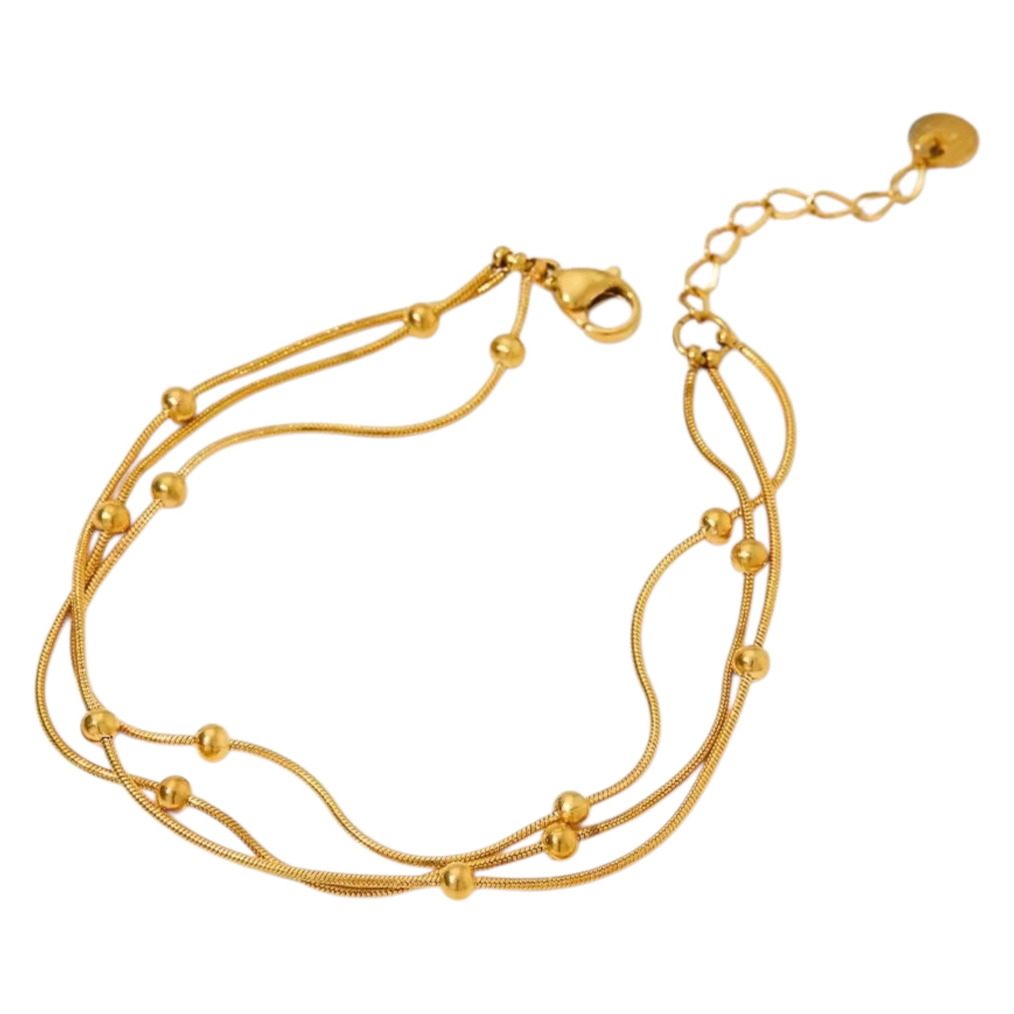 Flerlaget armbånd med små gulddetaljer